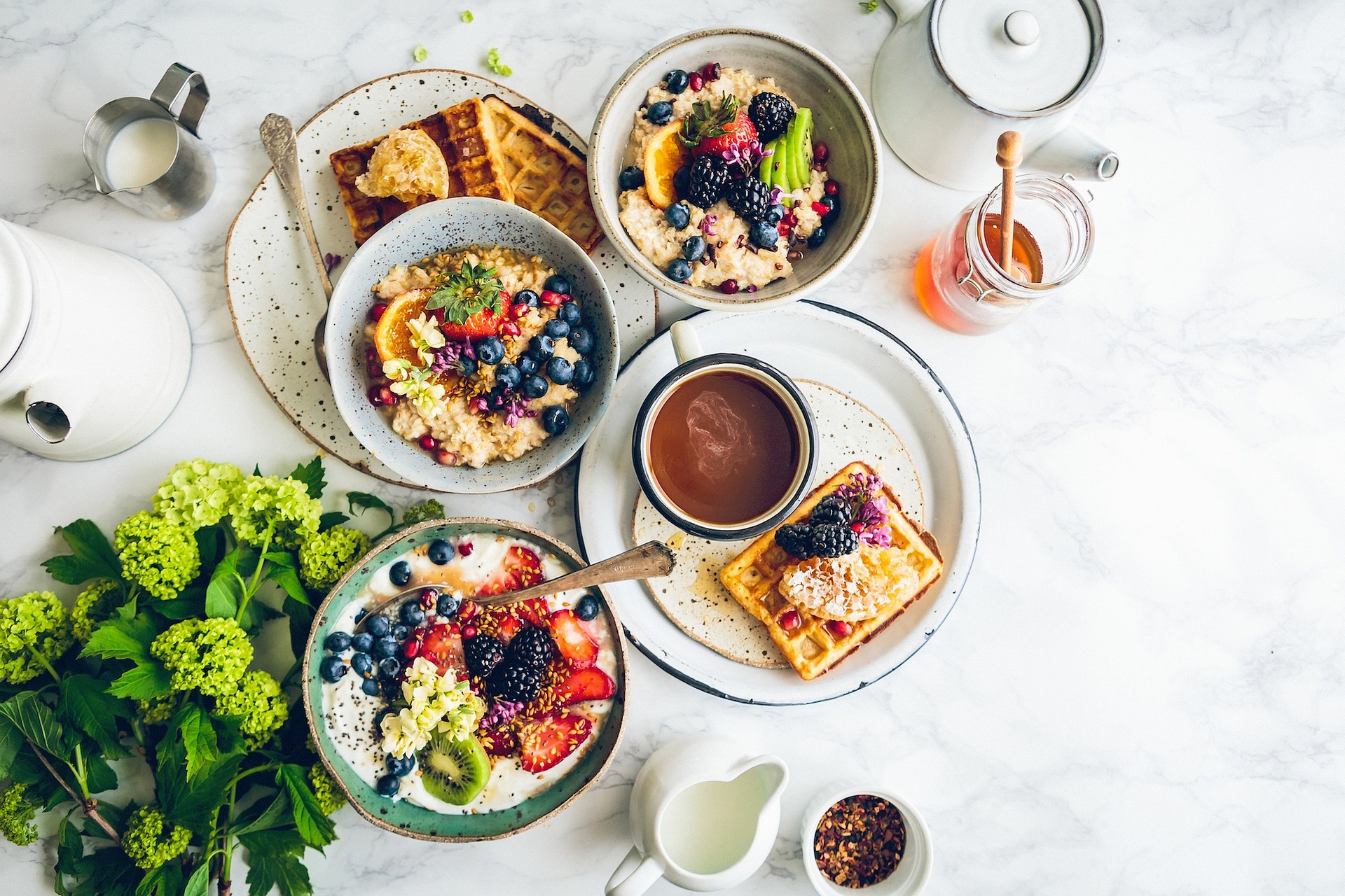 A bright and colorful spread of assorted breakfast foods
